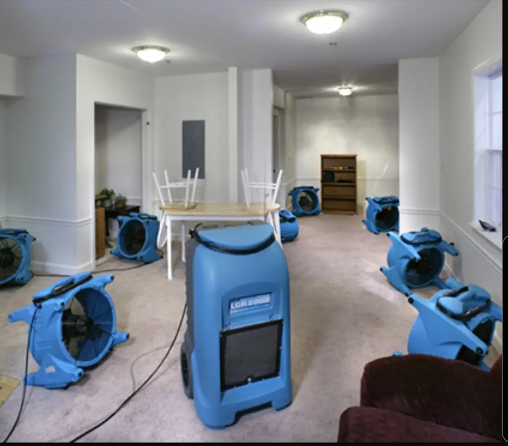 Air movers and dehumidifier setup for Water Damage Restoration in Ledyard